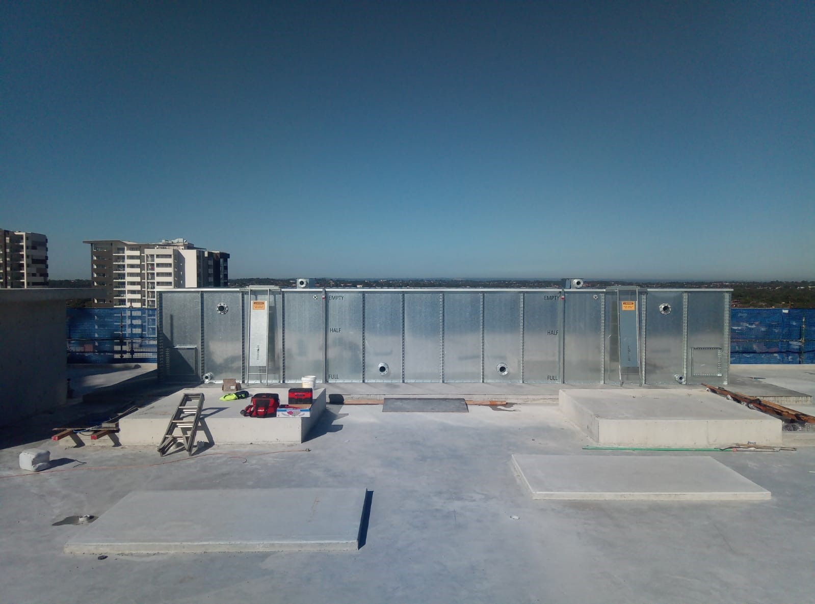 rooftop water storage tanks setting